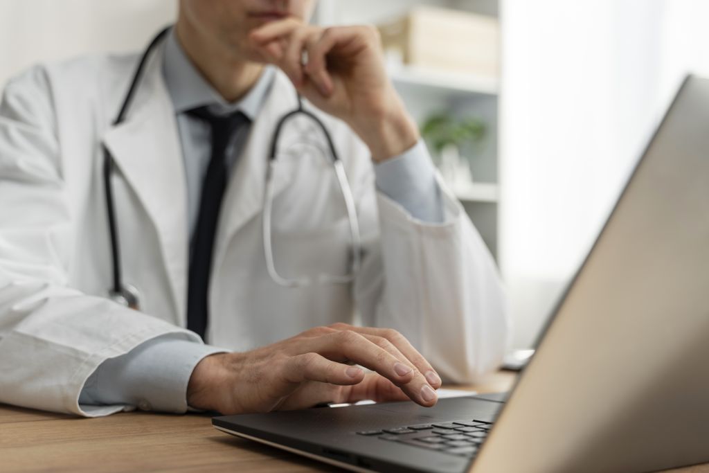 doctor on laptop