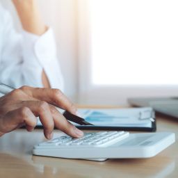 Healthcare provider reviewing vaccine inventory to manage rising costs in an independent practice